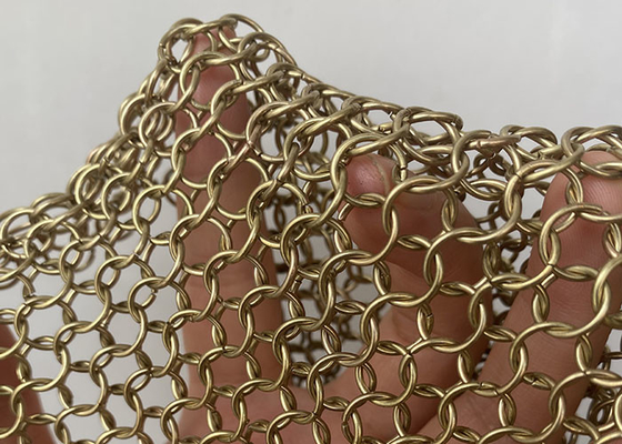Un buon prezzo. Acciaio inossidabile Ring Mesh Fabric Chainmail Curtain 304ss del metallo di colore dell'oro in linea